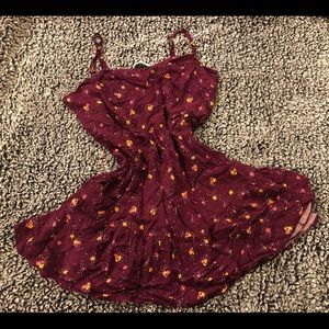 Cami straps dress with a flare.